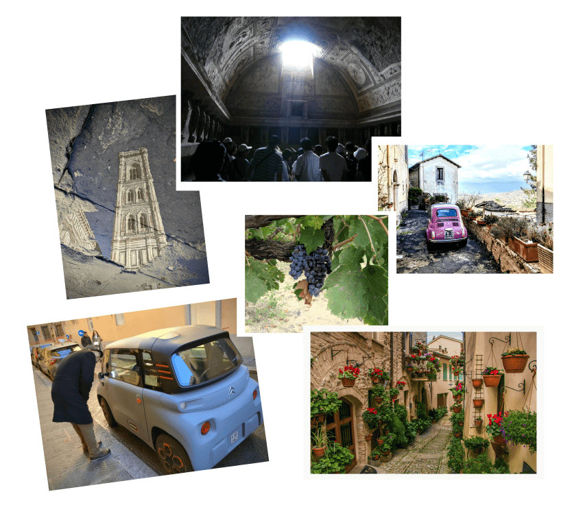 An indoor view of a historic building featuring intricate frescoes and ornate architecture illuminated by natural sunlight through a window.